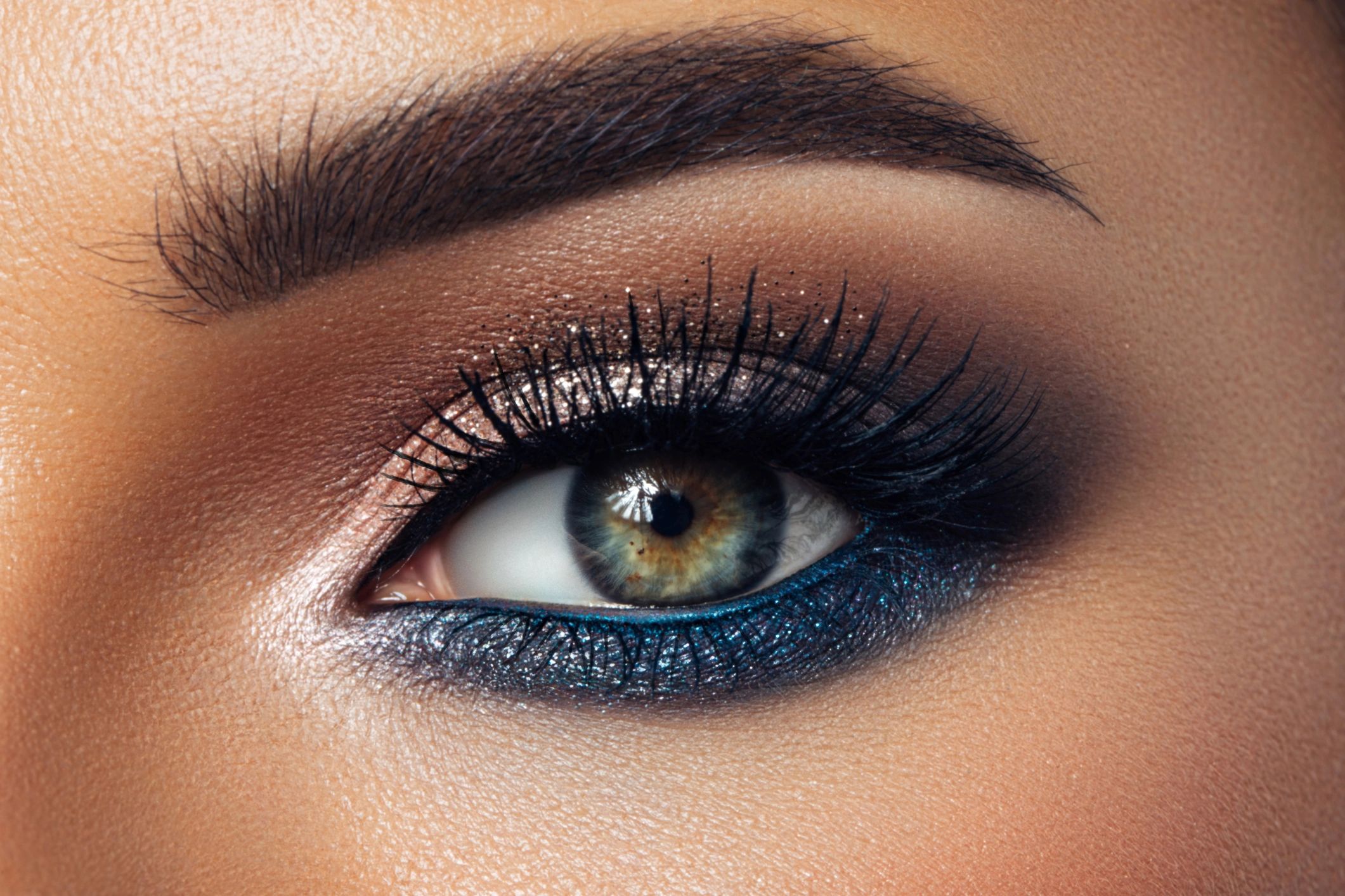 Close-up beauty image highlighting lashes and eye makeup