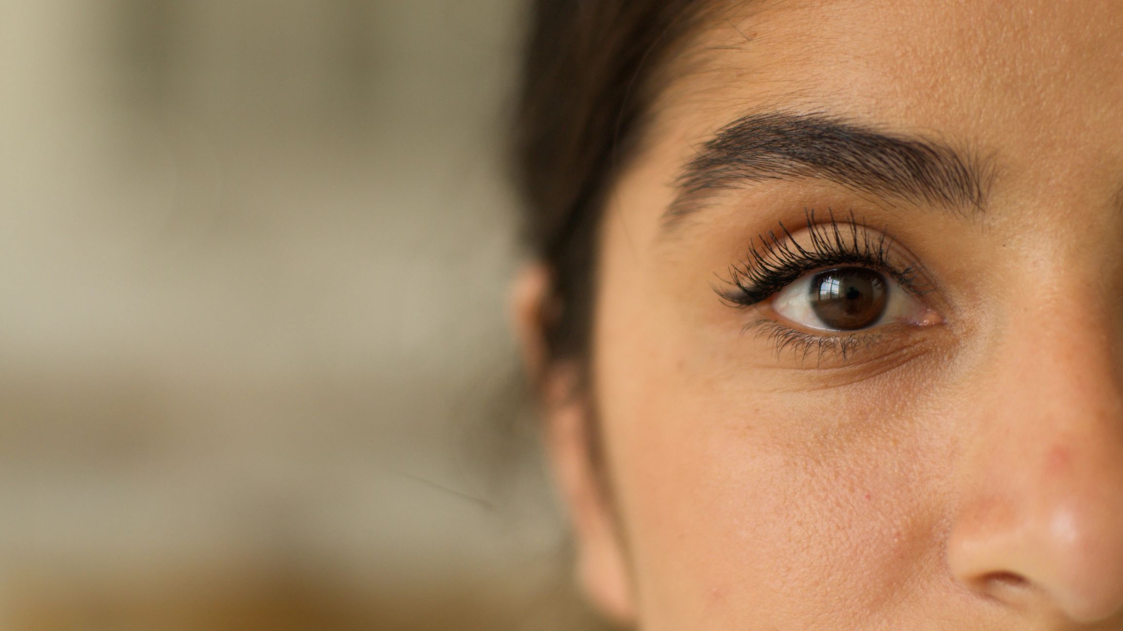 Close-up of eye with defined lashes